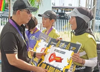 Meski Diguyur Hujan, Para Runner Bertuah Pos City Run 2024 Tetap Semangat