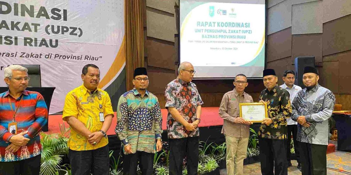 Mitra Pendukung Payroll System, BRK Syariah Terima Penghargaan dair Baznas Riau